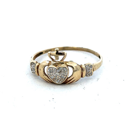 9ct yellow gold Claddagh ring in size V with detailed heart and hands design, crafted by Reeves and Sons.