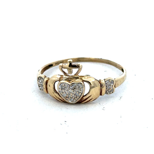 9ct yellow gold Claddagh ring in size V with detailed heart and hands design, crafted by Reeves and Sons.