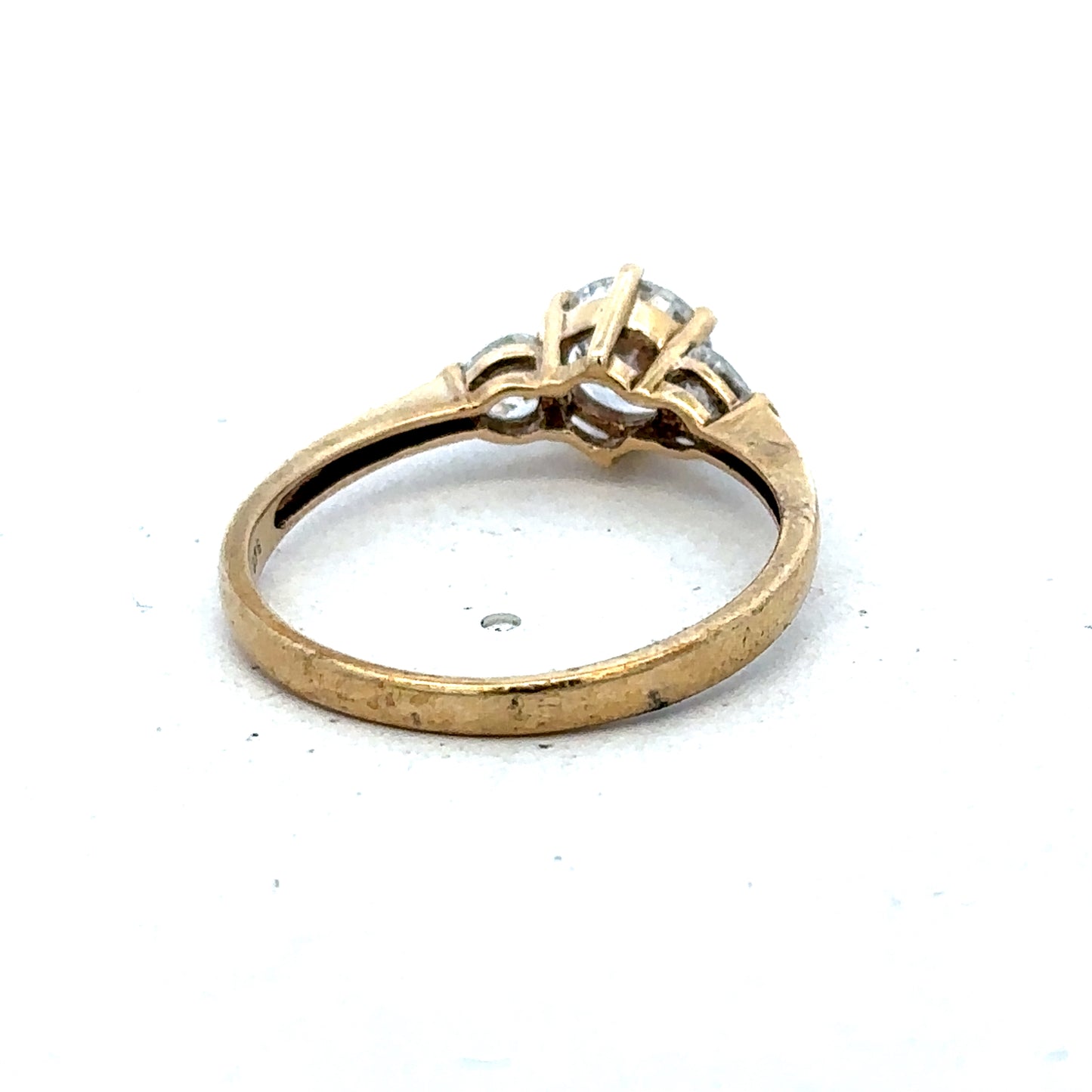 9ct yellow gold CZ ring in size U with intricate band design, showcasing sparkling cubic zirconia stones.