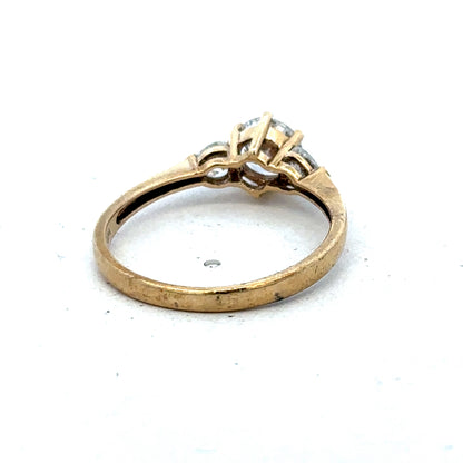 9ct yellow gold CZ ring in size U with intricate band design, showcasing sparkling cubic zirconia stones.