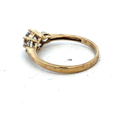 9ct yellow gold CZ ring in size U with intricate band design, crafted by Reeves and Sons.