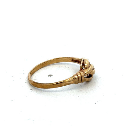 9ct yellow gold ring size N from Reeves and Sons, featuring a smooth polished band and classic design.
