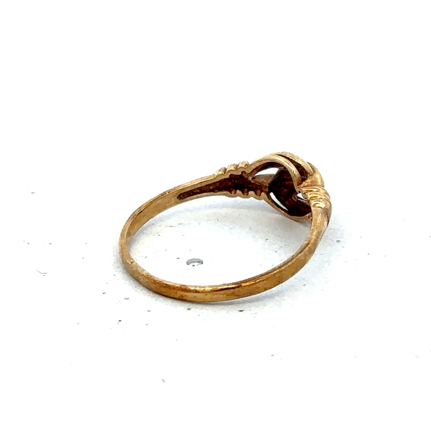 9ct yellow gold ring in size N with a smooth band, crafted by Reeves and Sons, shown on a plain background.