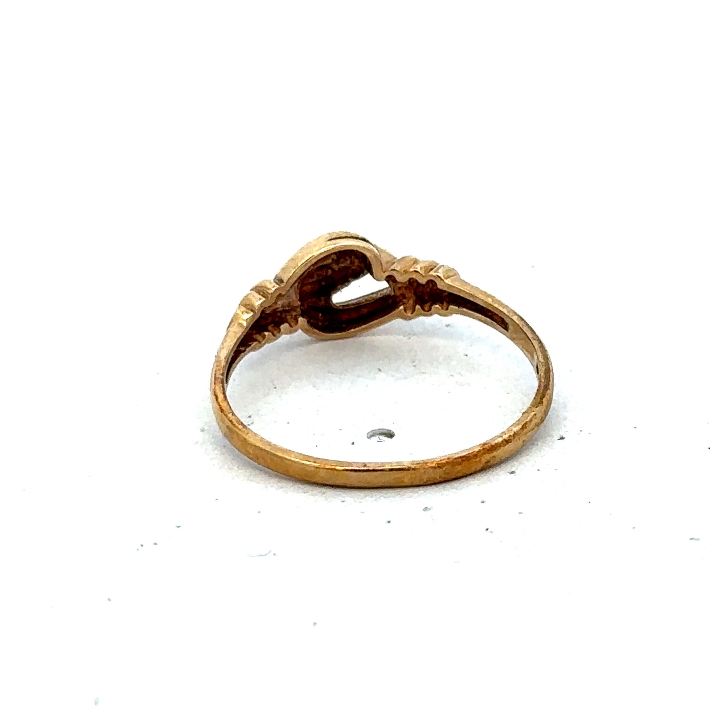 9ct yellow gold ring size N by Reeves and Sons, showcasing a smooth polished band on a white background.