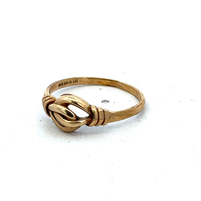 9ct yellow gold ring in size N with a smooth band, crafted by Reeves and Sons, displayed on a plain background.