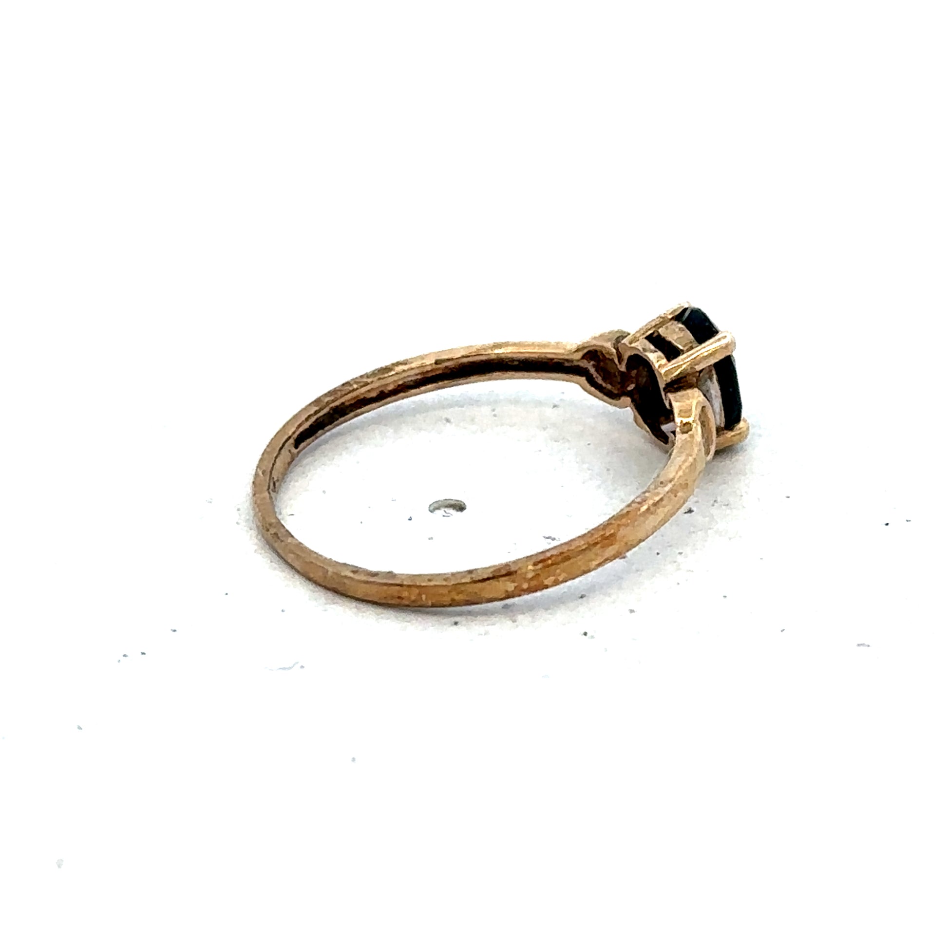 9ct yellow gold ring in size M with a smooth band, crafted by Reeves and Sons, displayed on a neutral background.