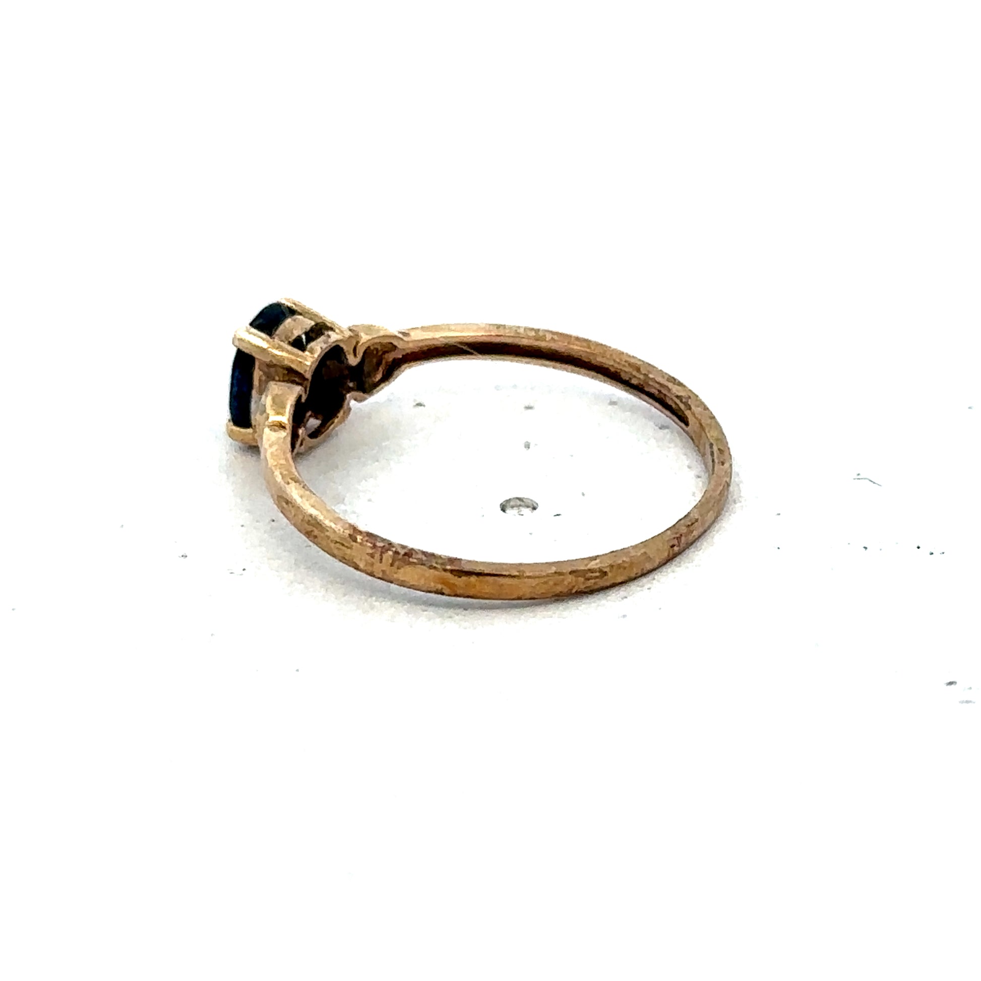 Gold ring in size M with a smooth band, crafted from 9ct yellow gold by Reeves and Sons.
