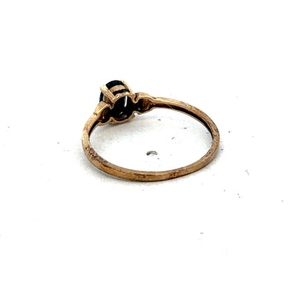 9ct yellow gold ring in size M with a smooth band, crafted by Reeves and Sons, shown on a neutral background.