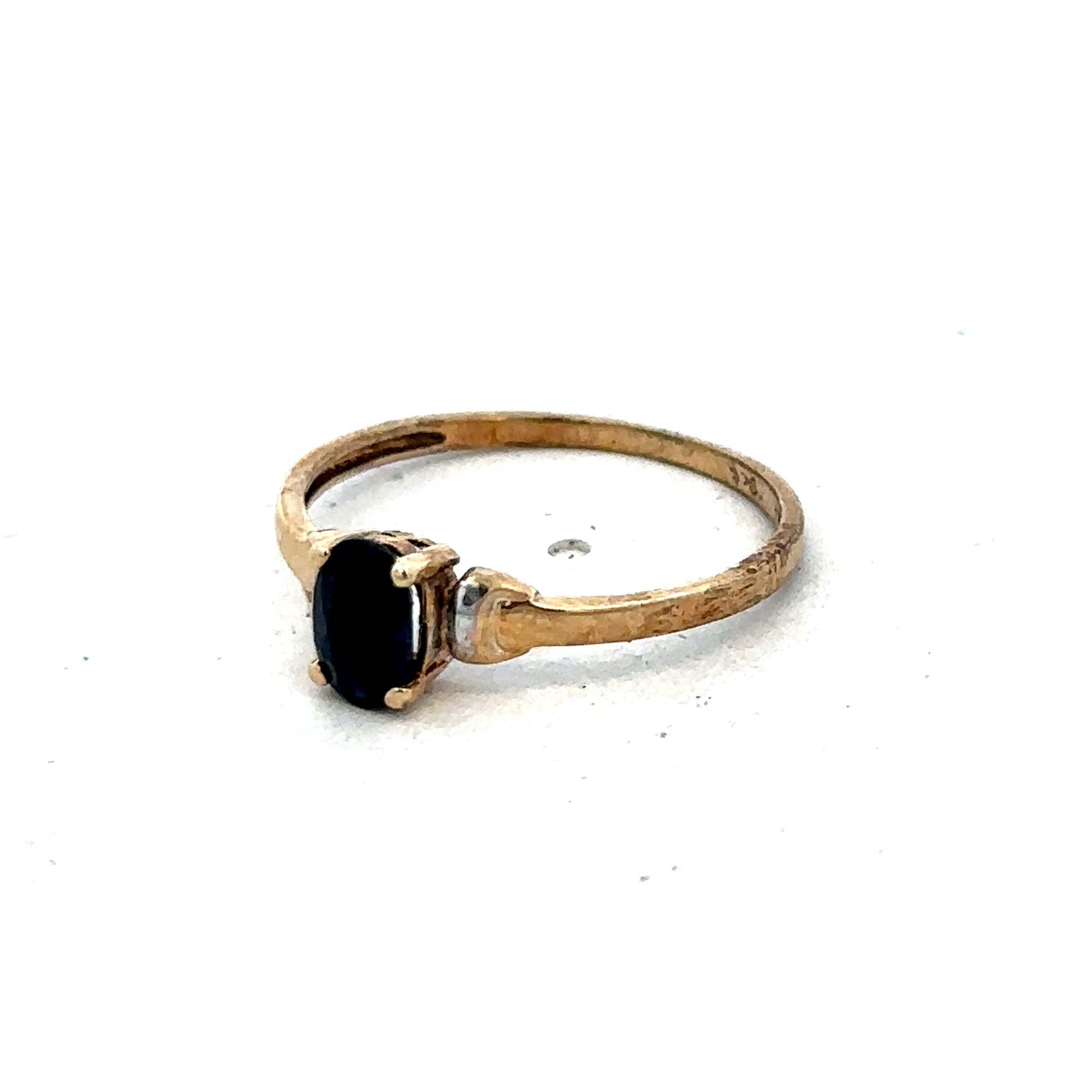 9ct yellow gold ring in size M by Reeves and Sons, featuring a smooth polished band on a white background.
