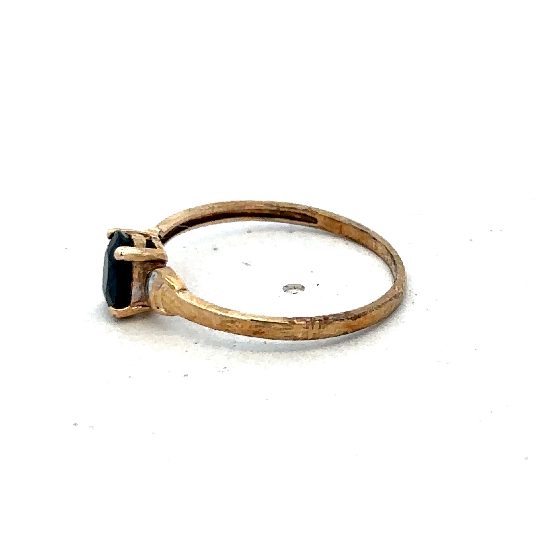 9ct yellow gold ring in size M with a smooth band, crafted by Reeves and Sons, displayed on a neutral background.