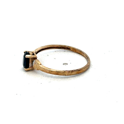 9ct yellow gold ring in size M with a smooth band, crafted by Reeves and Sons, displayed on a neutral background.