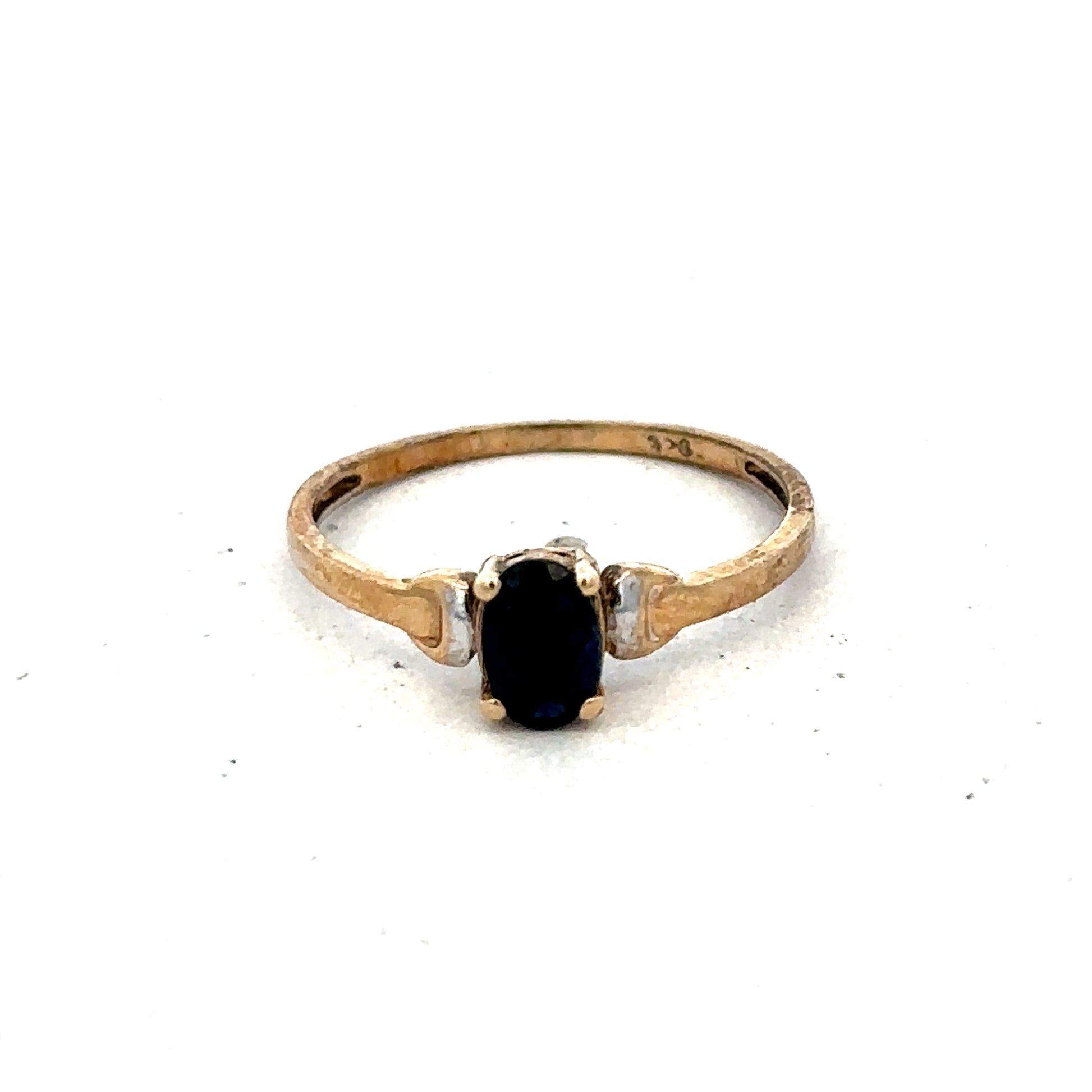 9ct yellow gold ring size M from Reeves and Sons, featuring a smooth, polished band with a classic design.