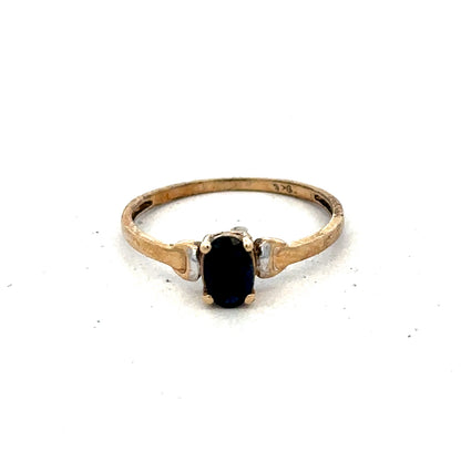 9ct yellow gold ring size M from Reeves and Sons, featuring a smooth, polished band with a classic design.