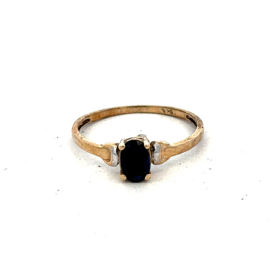 9ct yellow gold ring size M from Reeves and Sons, featuring a smooth, polished band with a classic design.
