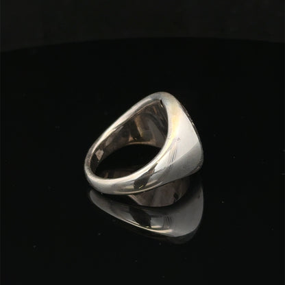 Silver ring size P from Reeves and Sons, detailed close-up showing smooth band and polished finish.