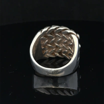 Silver keeper ring size Z1 by Reeves and Sons, showcasing a polished metal ring with a simple, elegant design.
