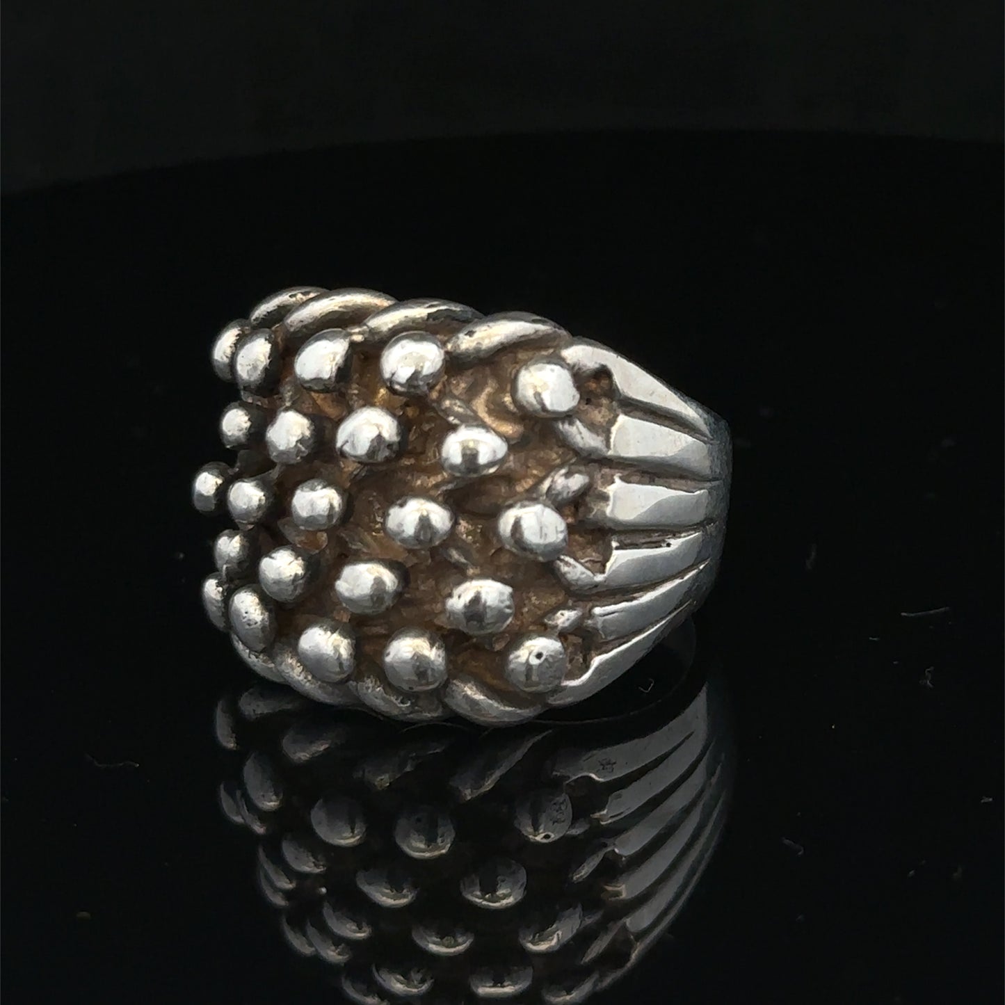 Silver keeper ring size Z1 by Reeves and Sons, featuring a sleek band design and polished finish.