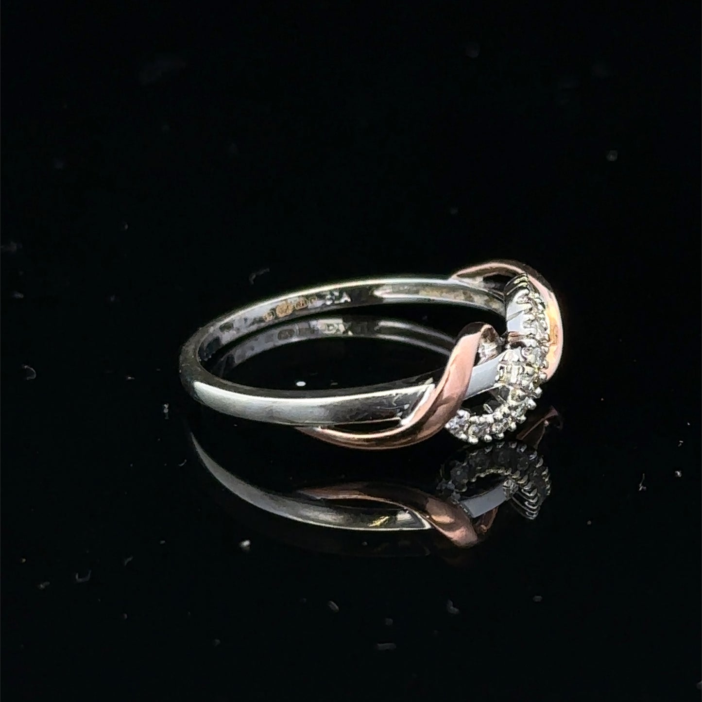 9ct white gold diamond ring in size M with sparkling diamonds, crafted by Reeves and Sons.