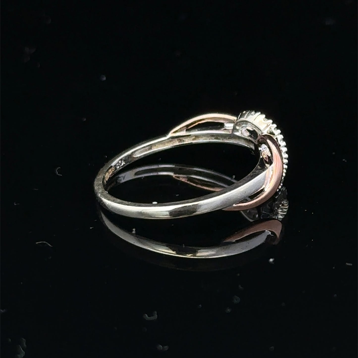 9ct white gold diamond ring in size M with sparkling diamonds, featuring a sleek design by Reeves and Sons.