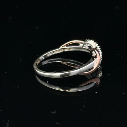 9ct white gold diamond ring in size M with sparkling diamonds, featuring a sleek design by Reeves and Sons.
