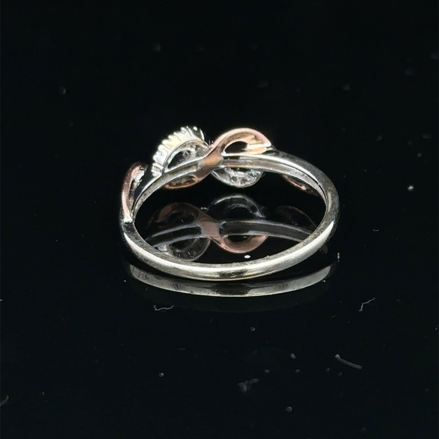9ct white gold diamond ring in size M with sparkling diamonds, crafted by Reeves and Sons.