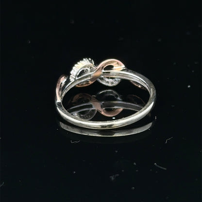 9ct white gold diamond ring in size M with sparkling diamonds, crafted by Reeves and Sons.