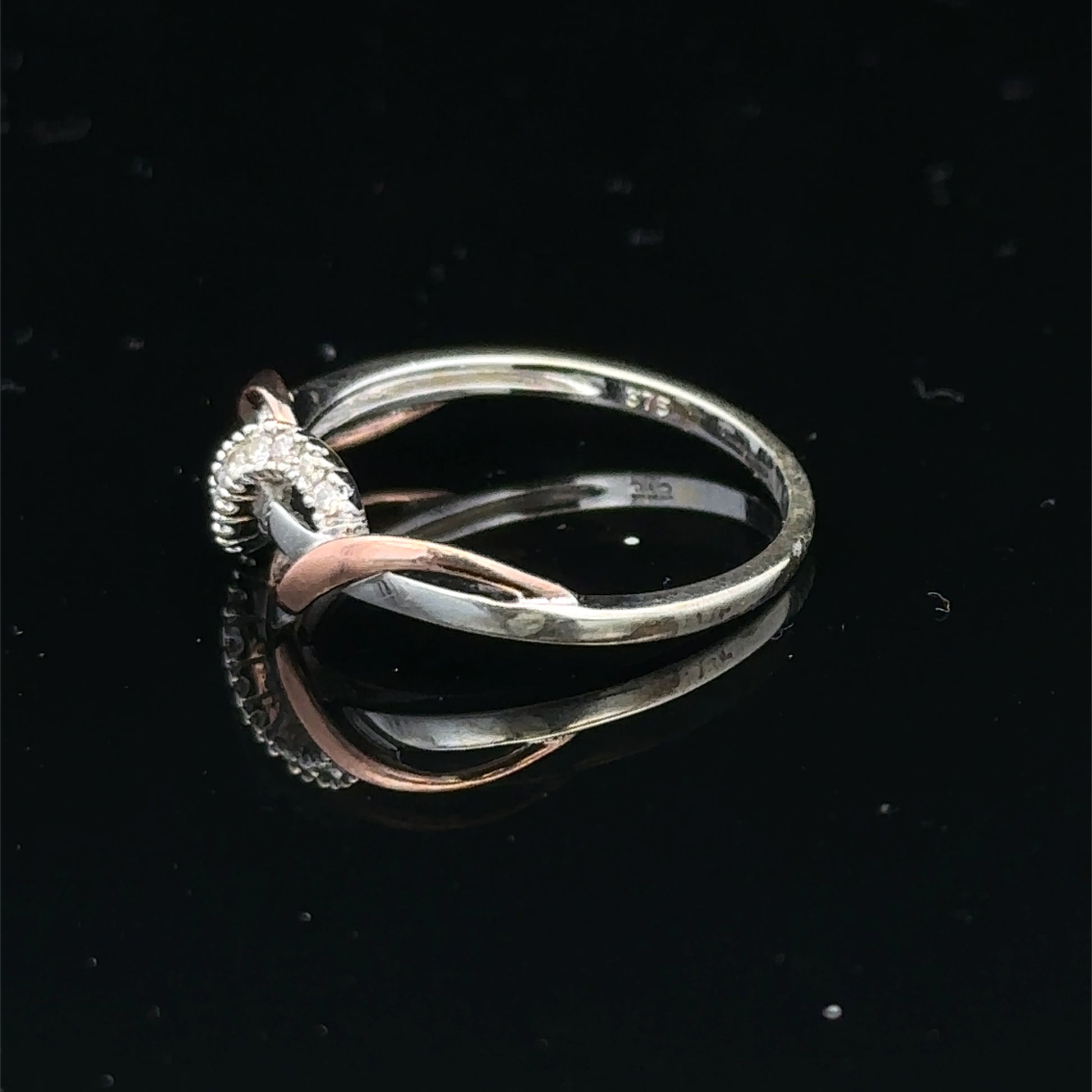 9ct white gold diamond ring in size M with sparkling diamonds, crafted by Reeves and Sons.