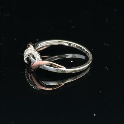 9ct white gold diamond ring in size M with sparkling diamonds, crafted by Reeves and Sons.