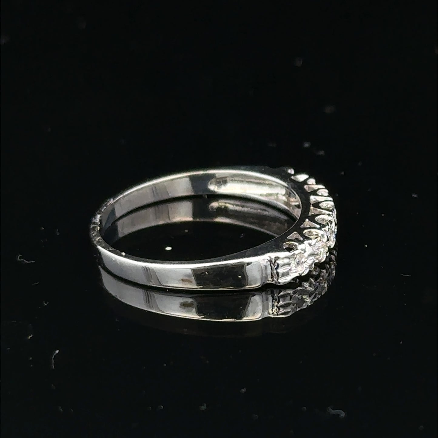 9ct white gold diamond ring in size O with sparkling diamonds, crafted by Reeves and Sons.
