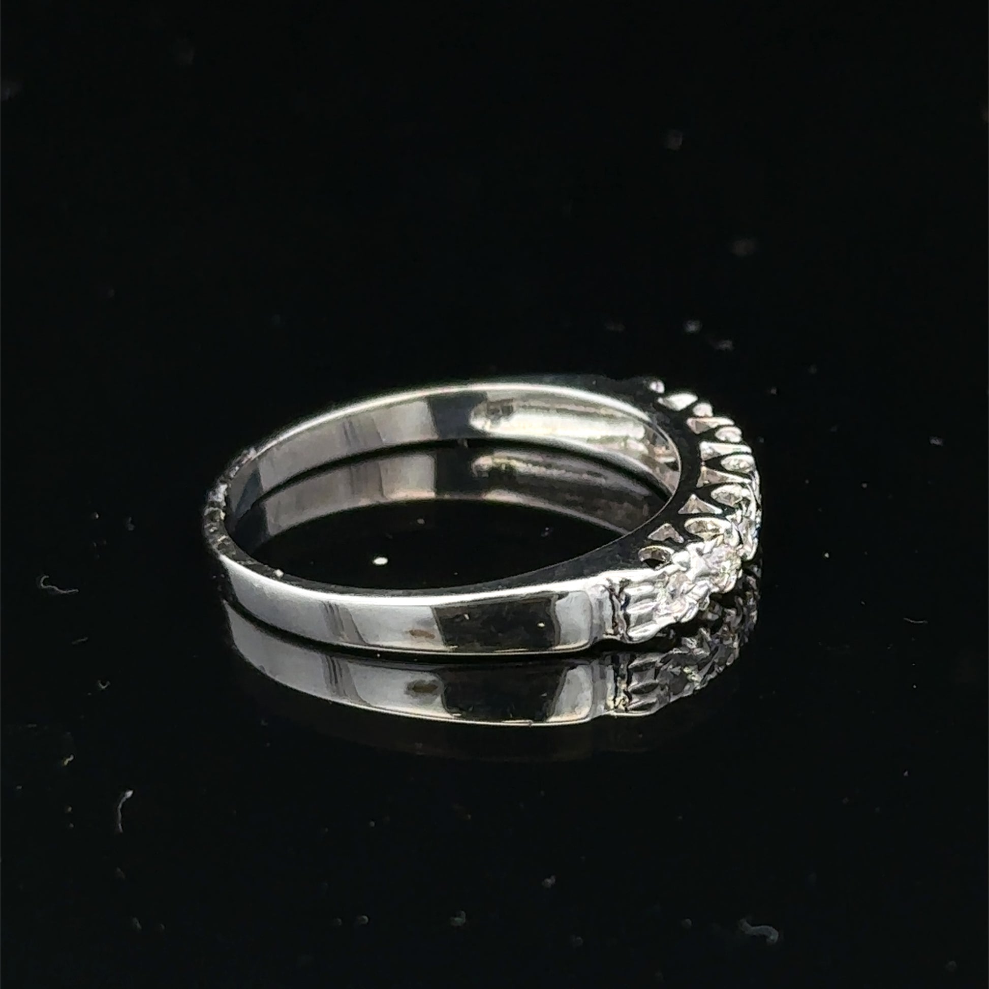9ct white gold diamond ring in size O with sparkling diamonds, crafted by Reeves and Sons.