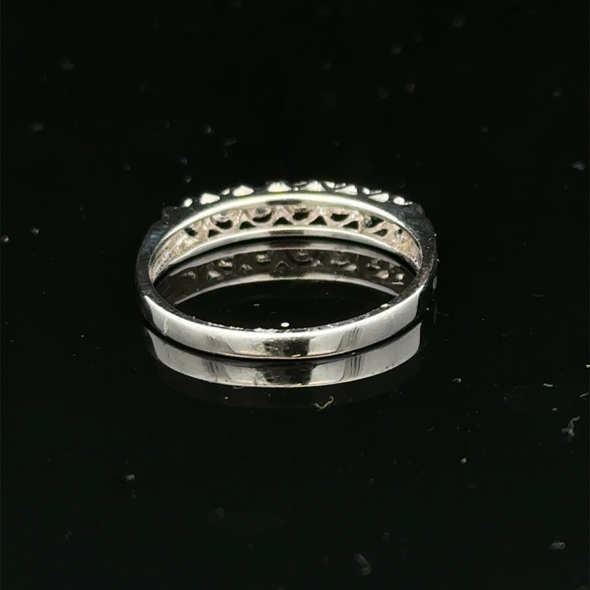 9ct white gold diamond ring in size O with sparkling diamonds, crafted by Reeves and Sons.