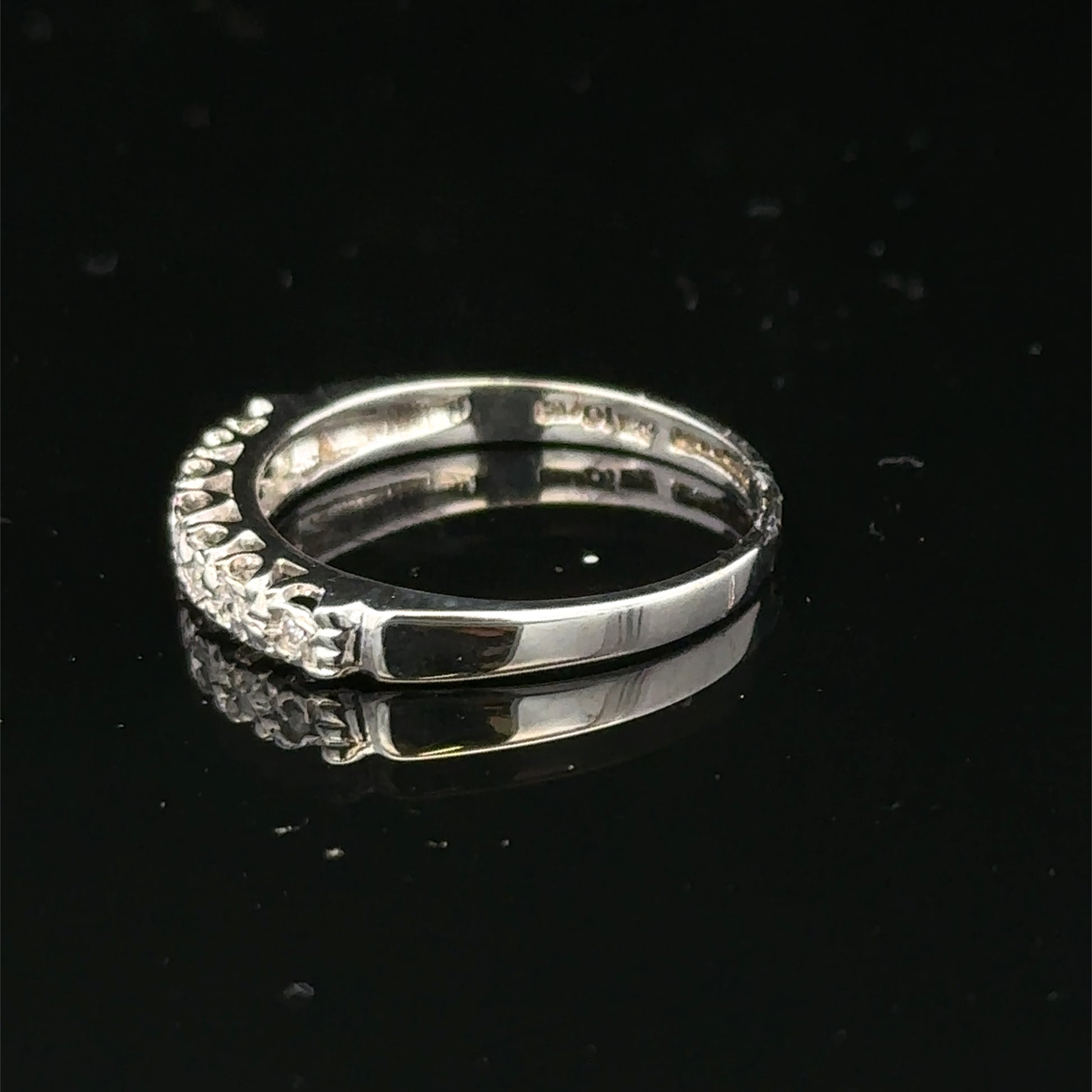 9ct white gold diamond ring in size O with sparkling diamonds, crafted by Reeves and Sons.