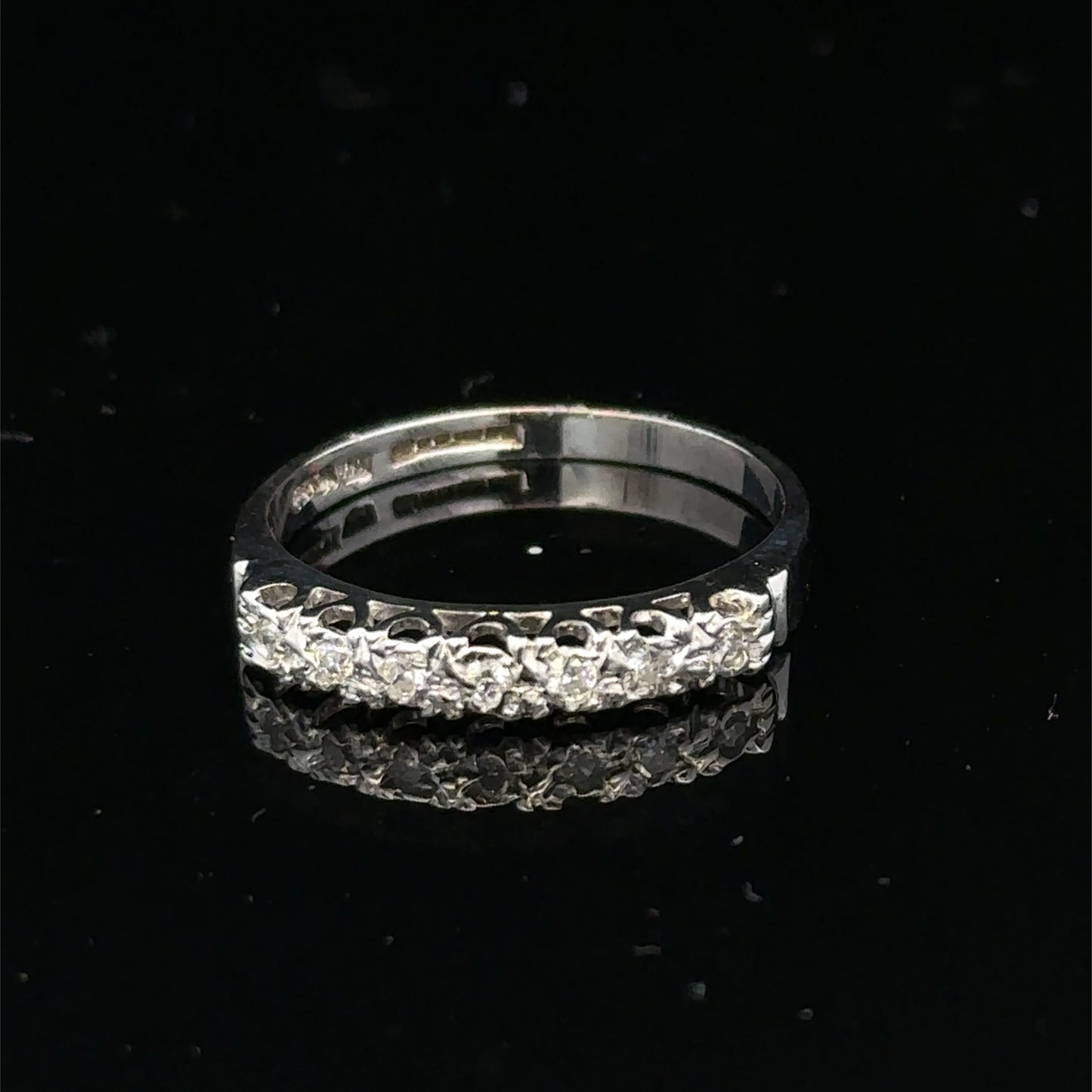 9ct white gold diamond ring in size O by Reeves and Sons, featuring a sparkling diamond setting on a polished band.