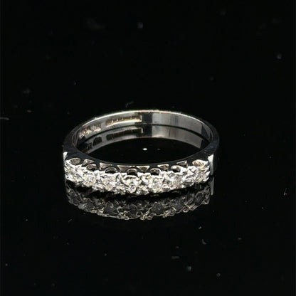9ct white gold diamond ring in size O by Reeves and Sons, featuring a sparkling diamond setting on a polished band.