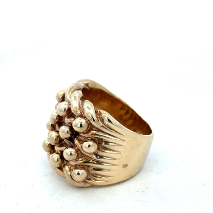 9ct yellow gold keeper ring size Y by Reeves and Sons, featuring a smooth polished band and secure fitting.