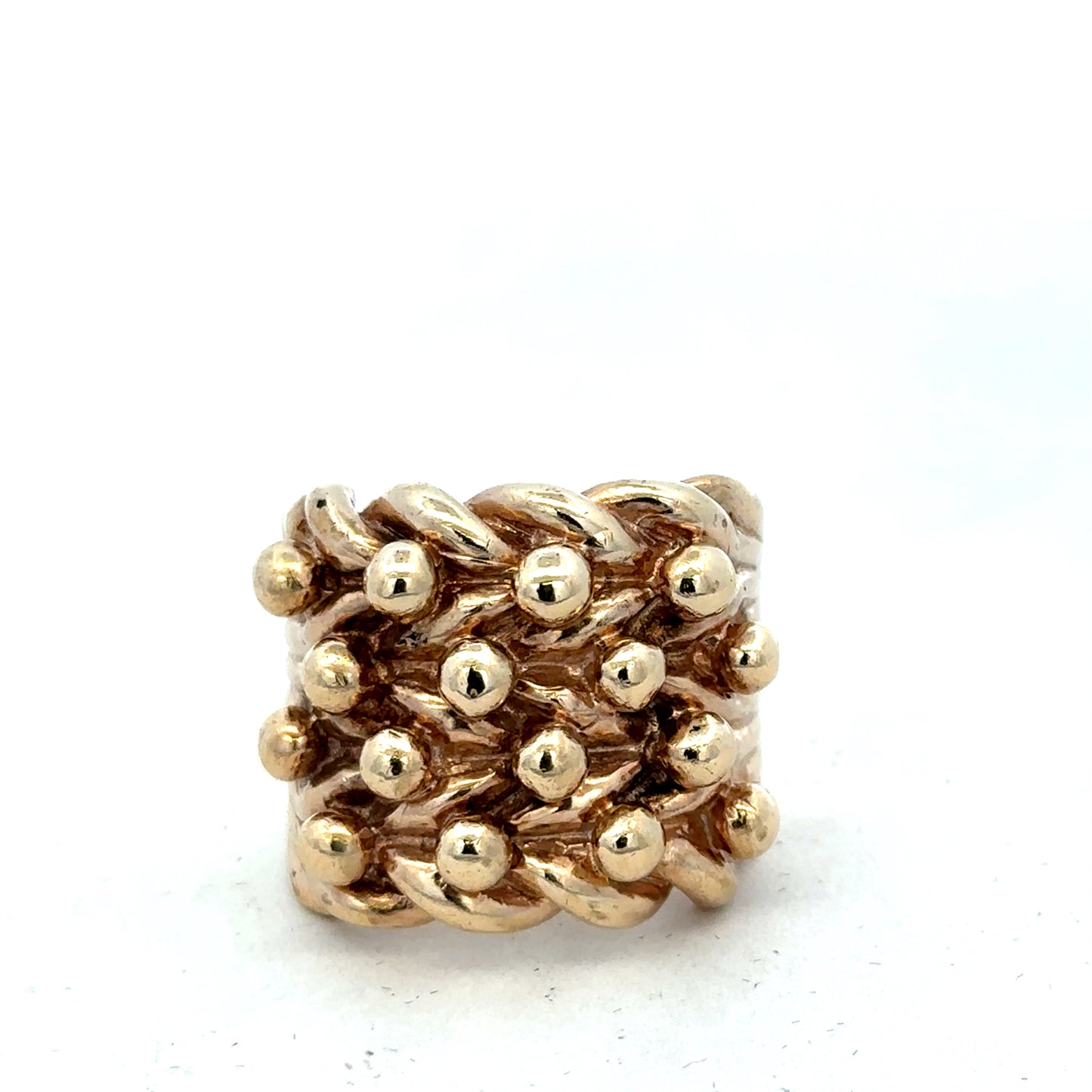 9ct yellow gold keeper ring in size Y with a smooth band, crafted by Reeves and Sons.