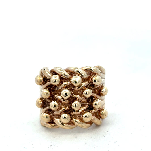 9ct yellow gold keeper ring in size Y with a smooth band, crafted by Reeves and Sons.