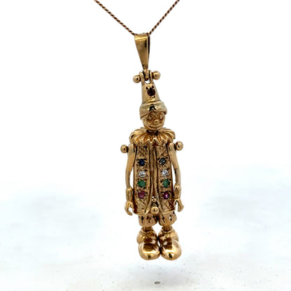9ct yellow gold clown pendant weighing 8.7g, detailed jewelry piece from Reeves and Sons, featuring a playful clown design.