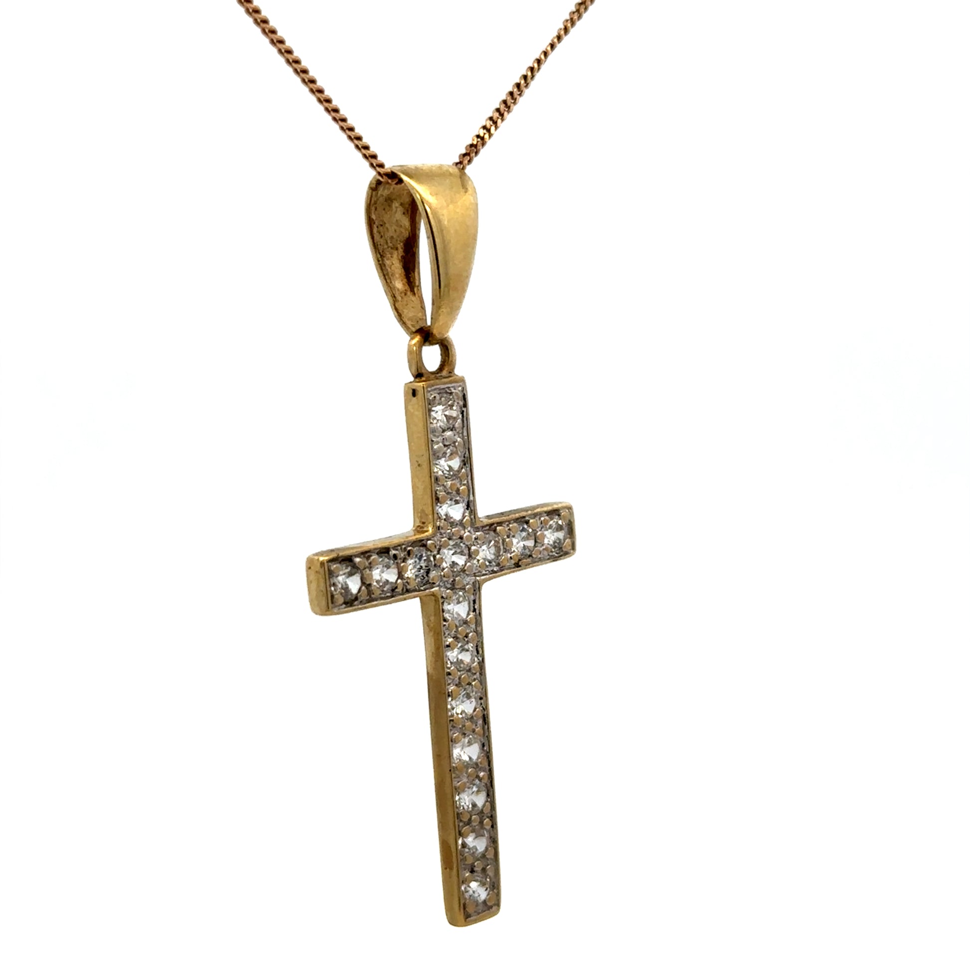 9ct yellow gold cross pendant with detailed design, weighing 4.6g, by Reeves and Sons, displayed on a neutral background.