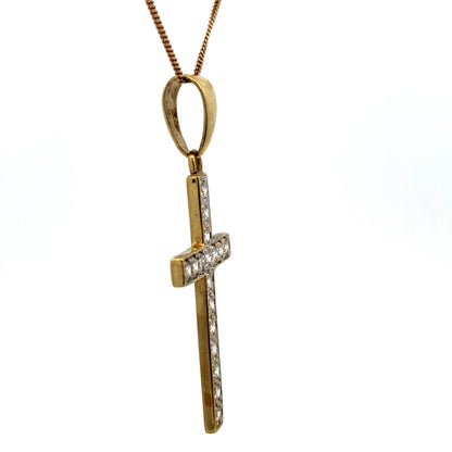 9ct yellow gold cross pendant weighing 4.6g, featuring a detailed design, from Reeves and Sons.