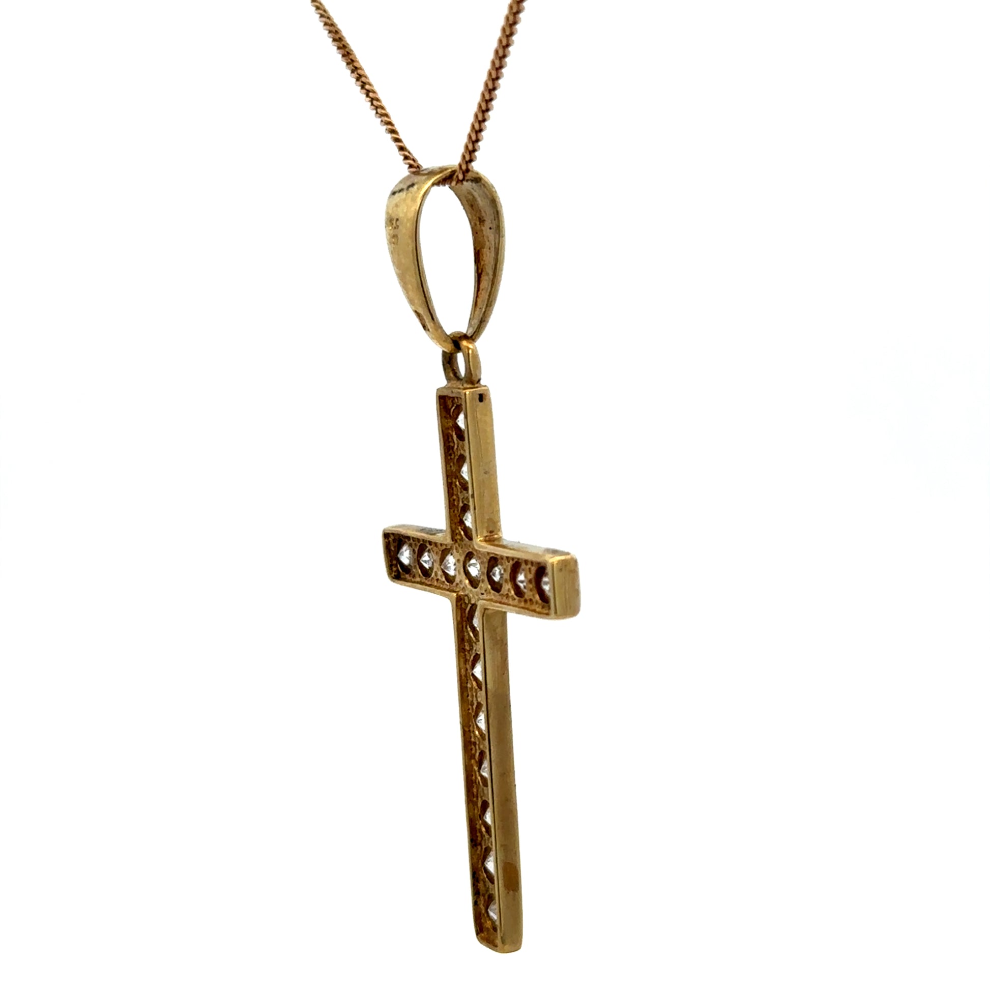 9ct yellow gold cross pendant weighing 4.6g with a polished finish, designed by Reeves and Sons, shown on a plain background.