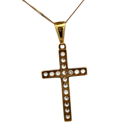 9ct yellow gold cross pendant weighing 4.6g, Reeves and Sons jewelry, detailed design, shown close-up on plain background.