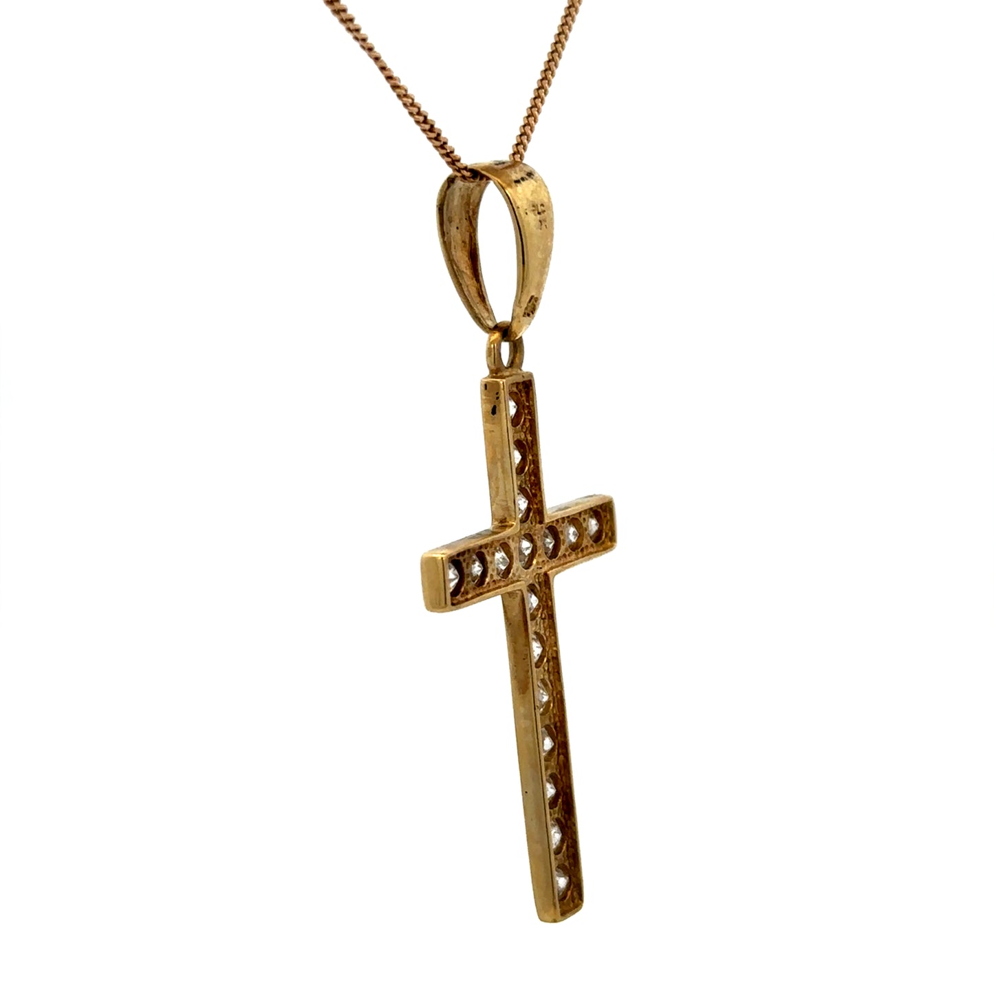 9ct yellow gold cross pendant with detailed design, weighs 4.6g, from Reeves and Sons, displayed on a plain background.