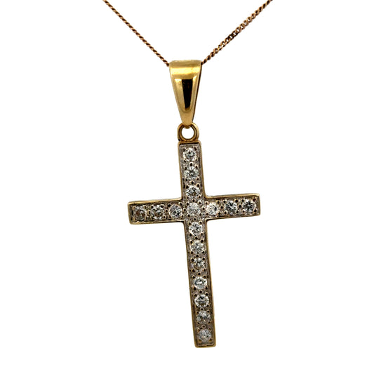 9ct yellow gold cross pendant weighing 4.6g, designed by Reeves and Sons, featuring a classic religious jewelry style.