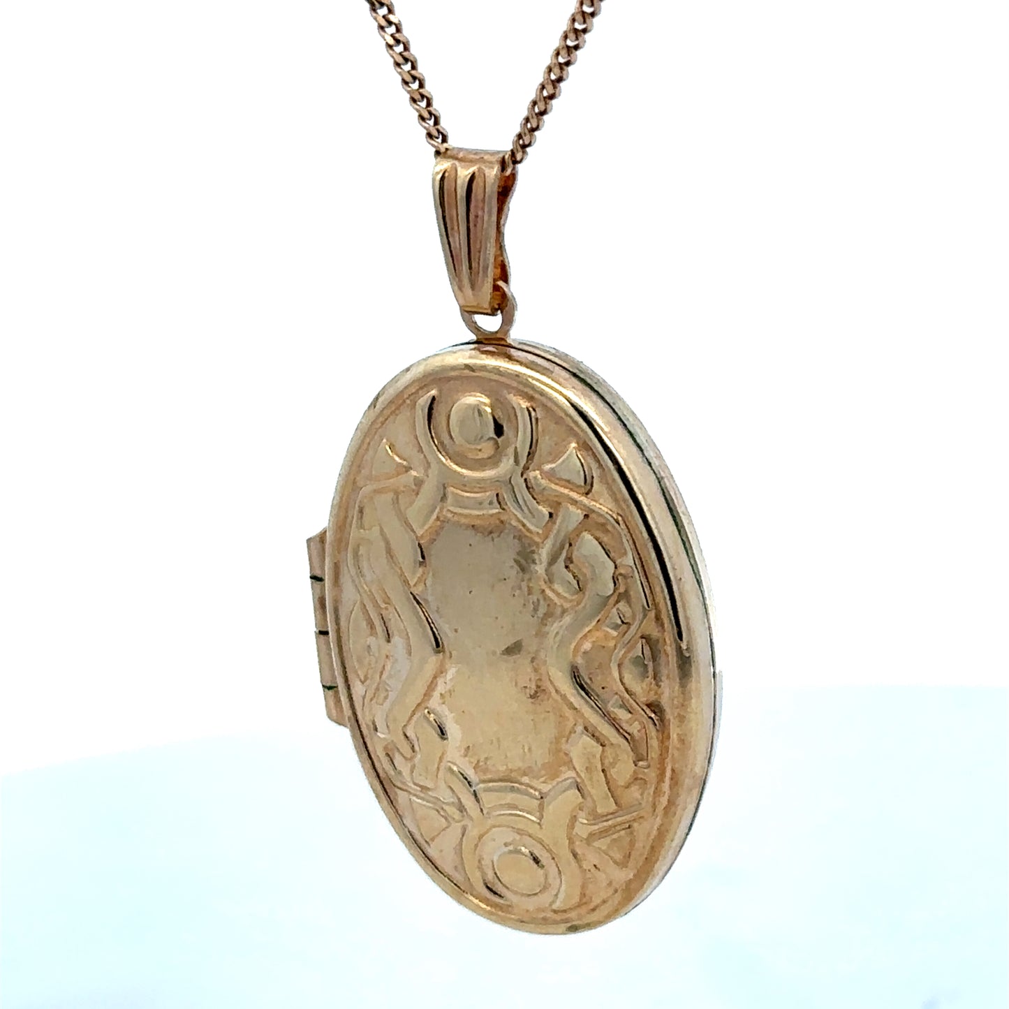 9ct yellow gold pendant locket by Reeves and Sons, showcasing a polished design with a secure clasp and smooth finish.