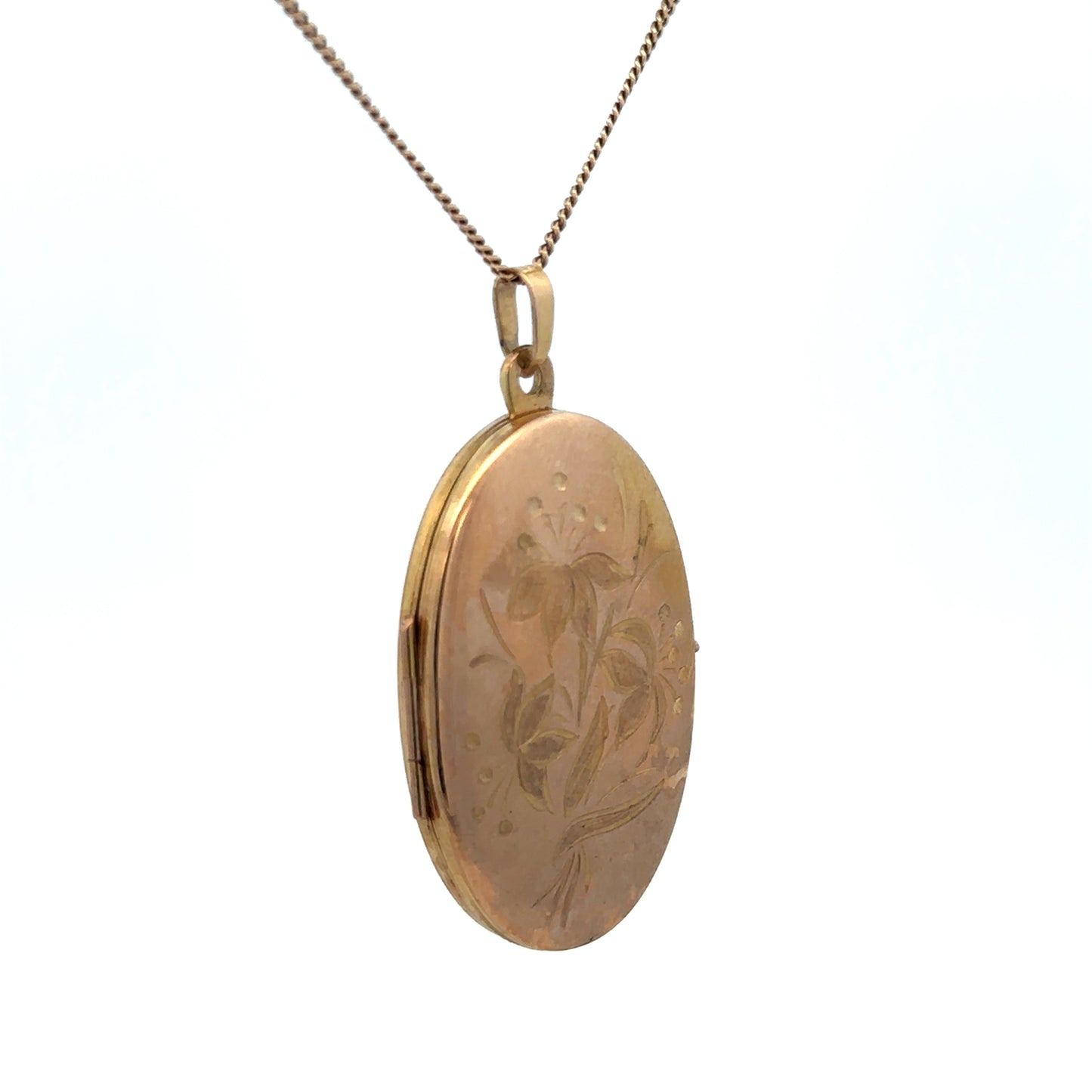 9ct yellow gold locket pendant from Reeves and Sons with a polished surface and intricate design, weighing 4.7g.