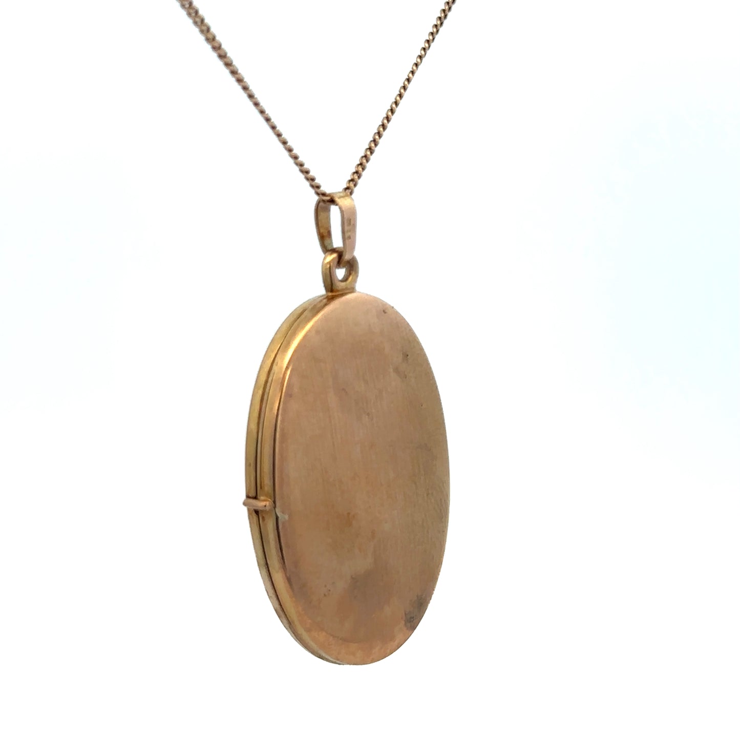 9ct yellow gold locket pendant by Reeves and Sons, 4.7g, showcasing a detailed, polished design with a secure bail attachment.
