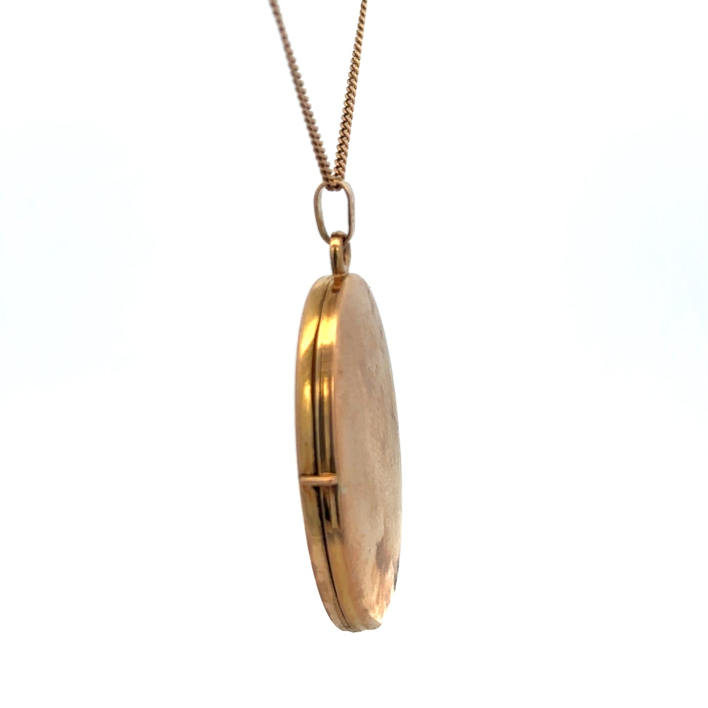 9ct yellow gold locket pendant by Reeves and Sons, 4.7g, featuring a polished smooth surface and classic design.
