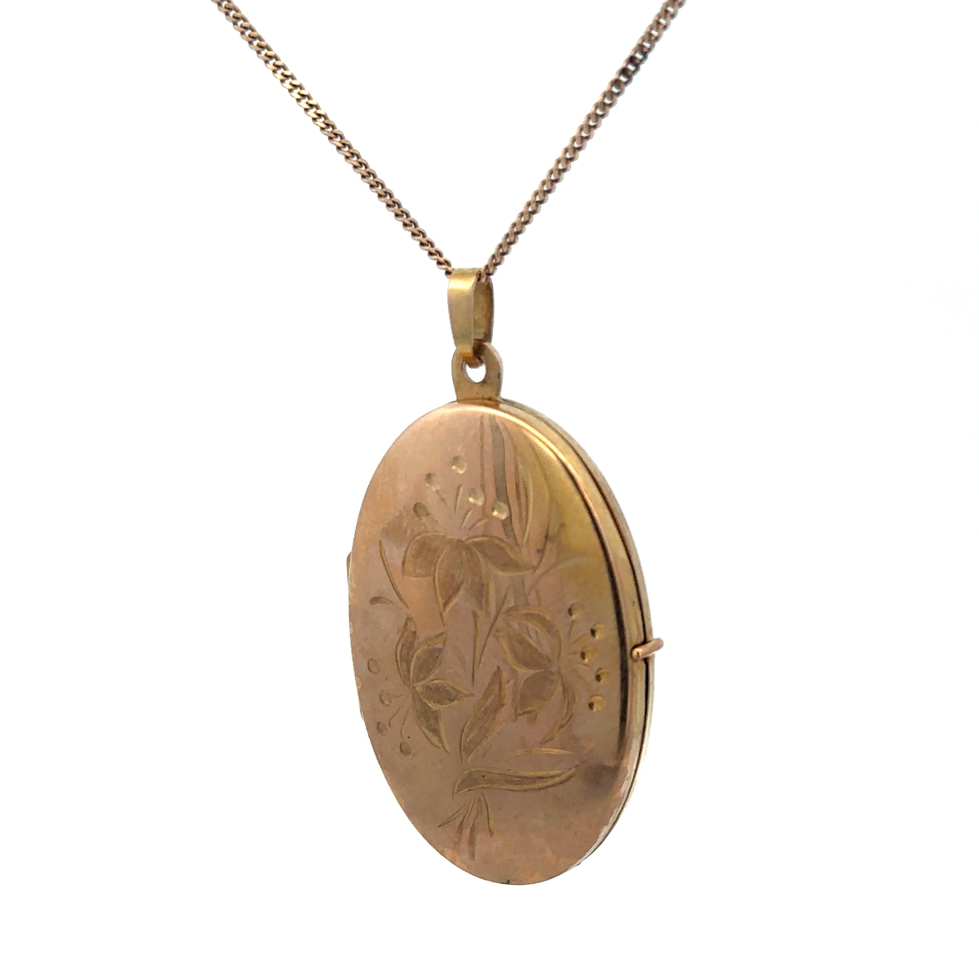 9ct yellow gold locket pendant by Reeves and Sons, 4.7g, showing intricate design and polished finish.