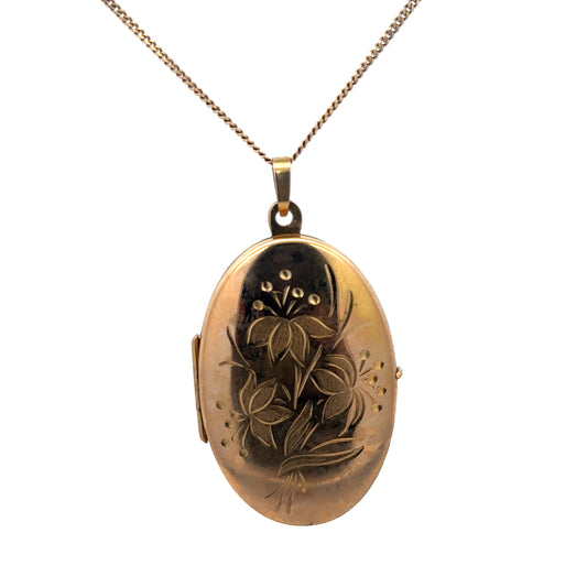 9ct yellow gold locket pendant by Reeves and Sons, featuring a polished, intricate design, weight 4.7g, shown with detailed craftsmanship.